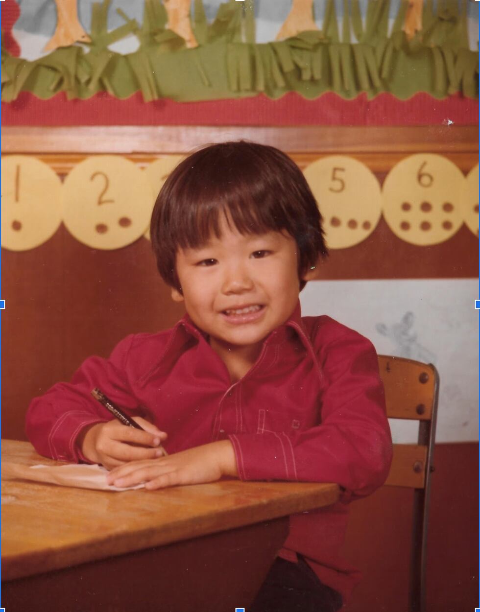 Hong found school difficult at first because he didn't speak English and couldn't communicate...