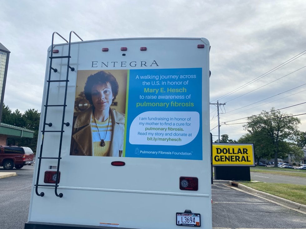 Mary Hesch promotes her fundraiser on the back of the RV she and friends are staying in during...