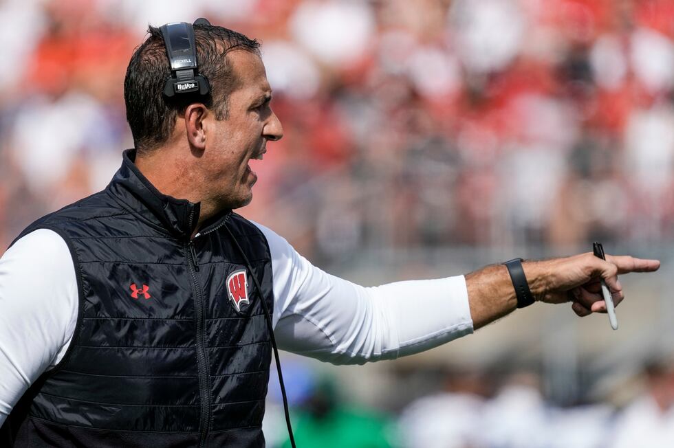 Wisconsin head coach Luke Fickell reacts during the first half of an NCAA college football...