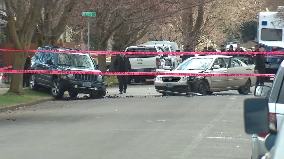 Three were found dead in a car after a midday shooting in North Portland, Oregon, on Saturday.