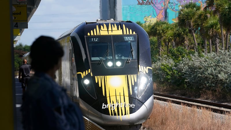A Brightline train approaches the Fort Lauderdale station on Friday, Sept. 8, 2023, in Fort...