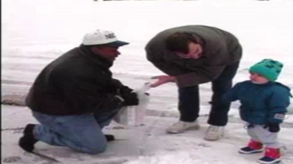 NBC15 late anchor Mike McKinney accepts a donation at the first NBC15 Share Your Holidays in...