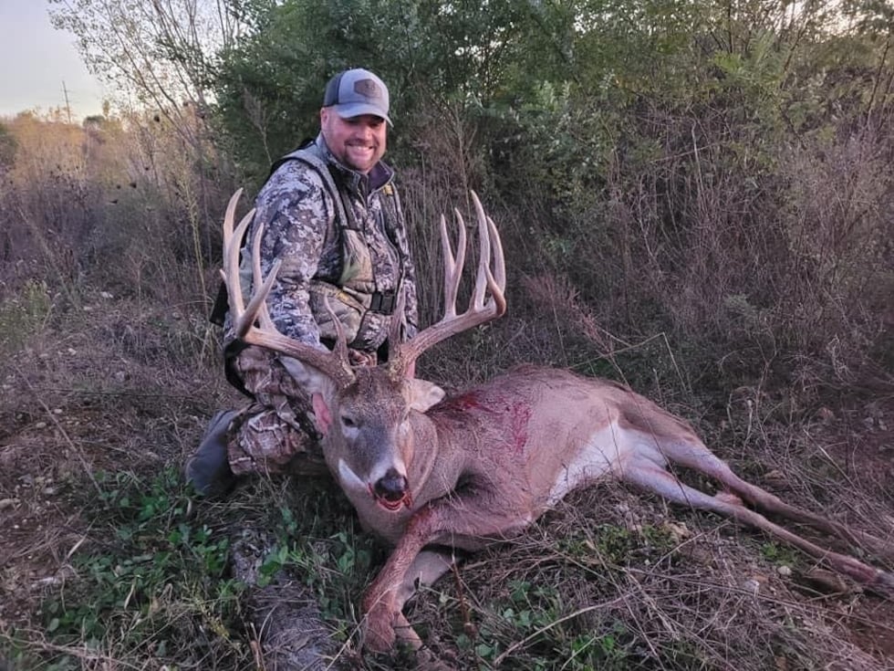 Jason Kline poses with his kill in 2021
