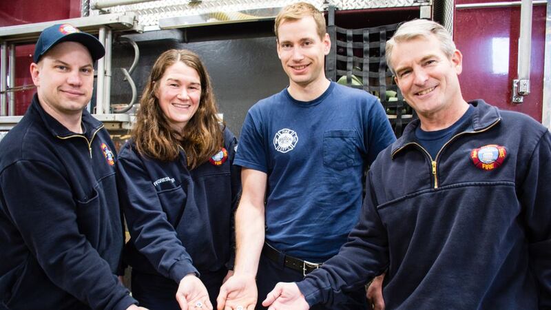 Four Madison Fire Department personnel earn stork pins after delivering baby boy