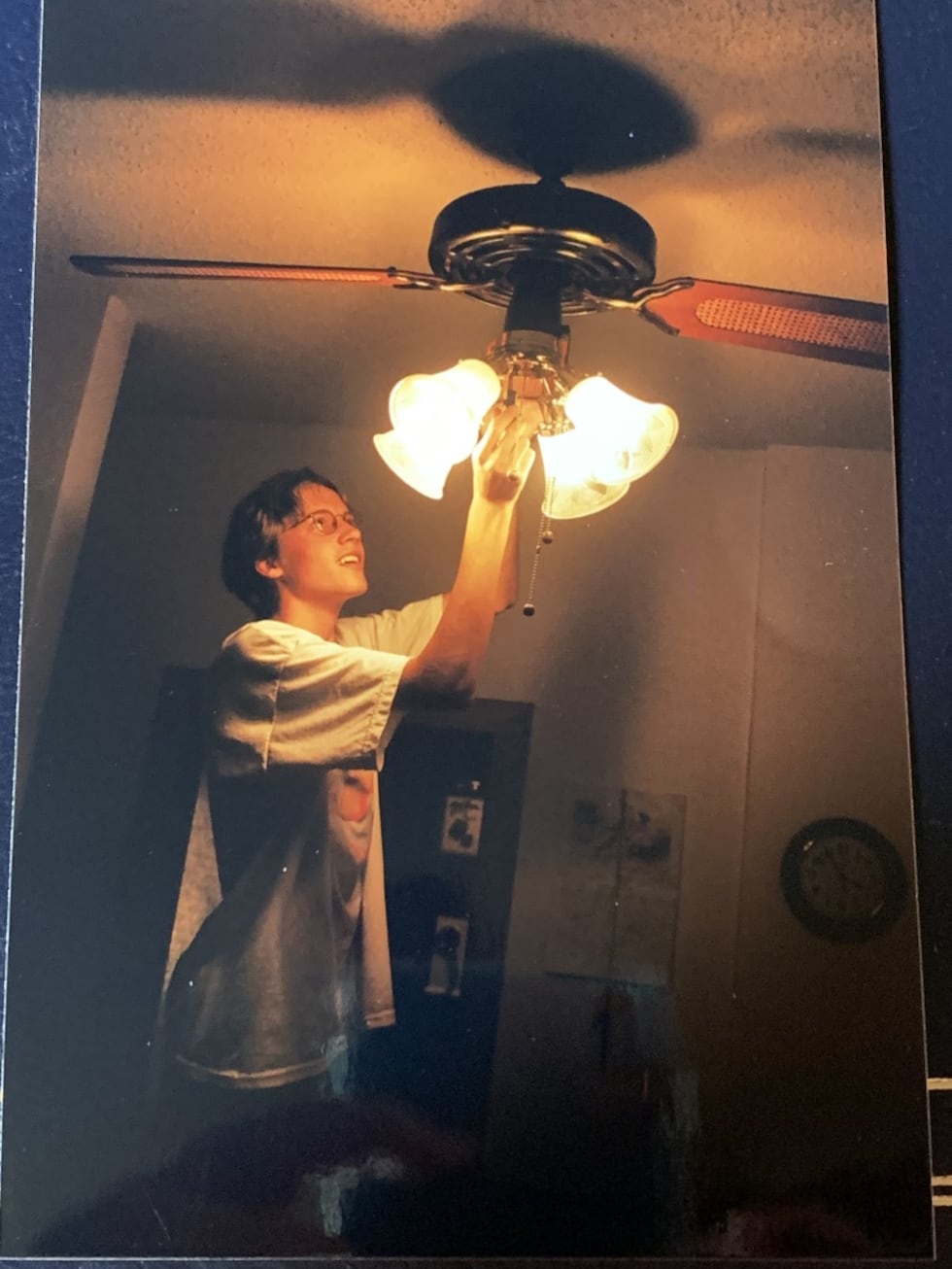 Dan “Spiffy” Neuman works on a ceiling fan as a teenager. His interest in fans started at a...