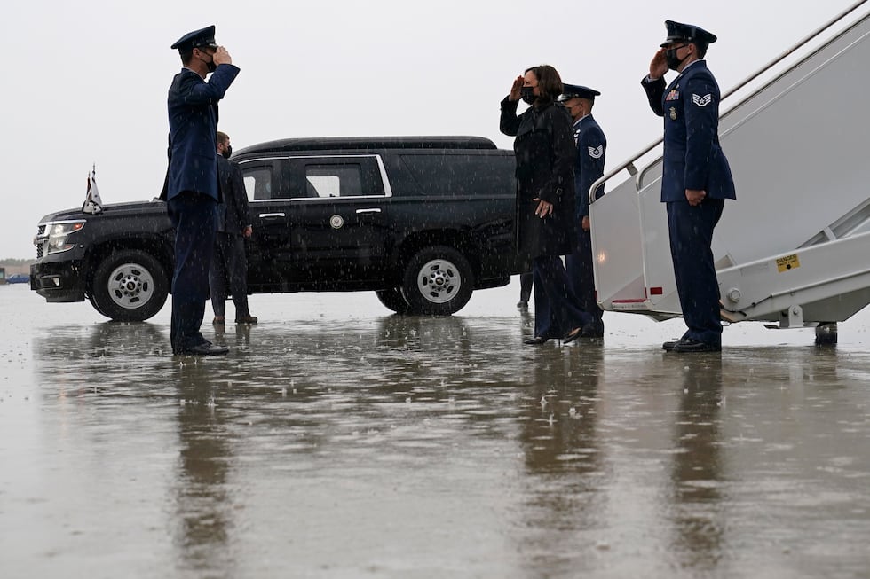 FILE - Vice President Kamala Harris salutes as she steps off of Air Force Two at Andrews Air...