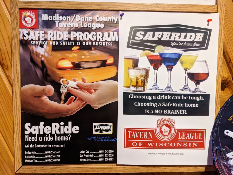 SafeRide posters hang in Doubleday's Sports Pub in Cottage Grove to remind patrons about the...